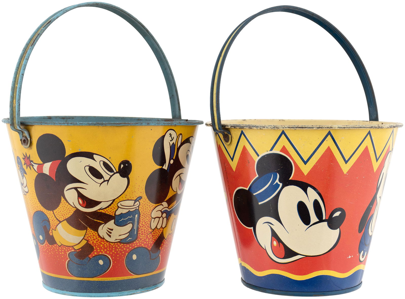 MICKEY MOUSE & FRIENDS LARGE HAPPYNAK SAND PAIL PAIR.: Pair of 5.75" tall (10" tall to top of raised handle) tin litho pails made in England by Happynak, 1950s. These are the largest size pails made by Happynak. First features wraparound scene of Mickey M