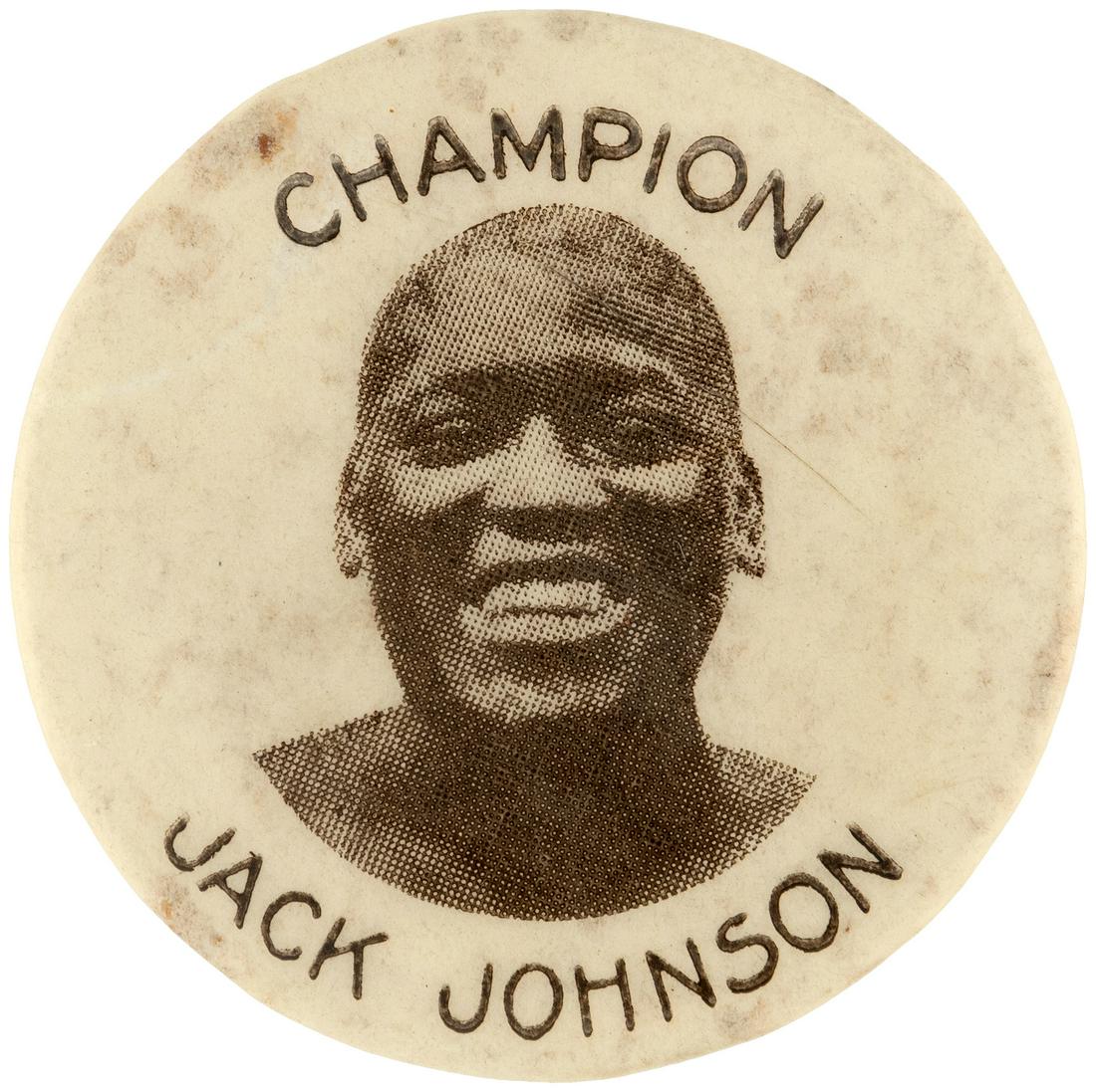 C. 1910 "CHAMPION JACK JOHNSON" SMILING PHOTO BUTTON BY: 1.25 with fixed bar pin and paper of "Newman Mfg. Co./Badges/Novelties/Toys/Cleveland, O". Likely produced for fight July 4, 1910 with Jack Jeffries ( see previous button). Cello has light age traces,