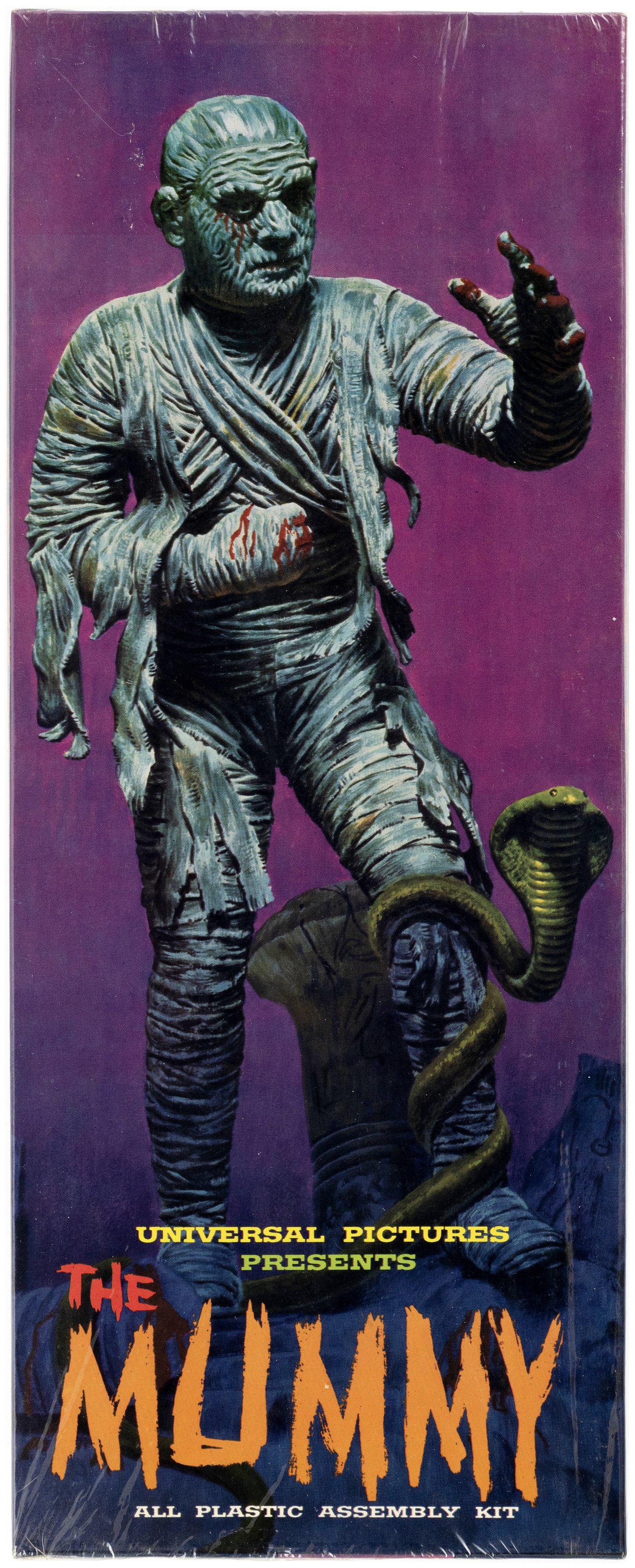 AURORA THE MUMMY FACTORY-SEALED BOXED MODEL KIT.: Kit No. 427-98. ©1963 Universal Pictures Co., Inc. Shrinkwrap has lt. corner tip wear, but box remains tightly sealed. Box is Exc. Factory-sealed with unused contents. High grade example. Greg Ro