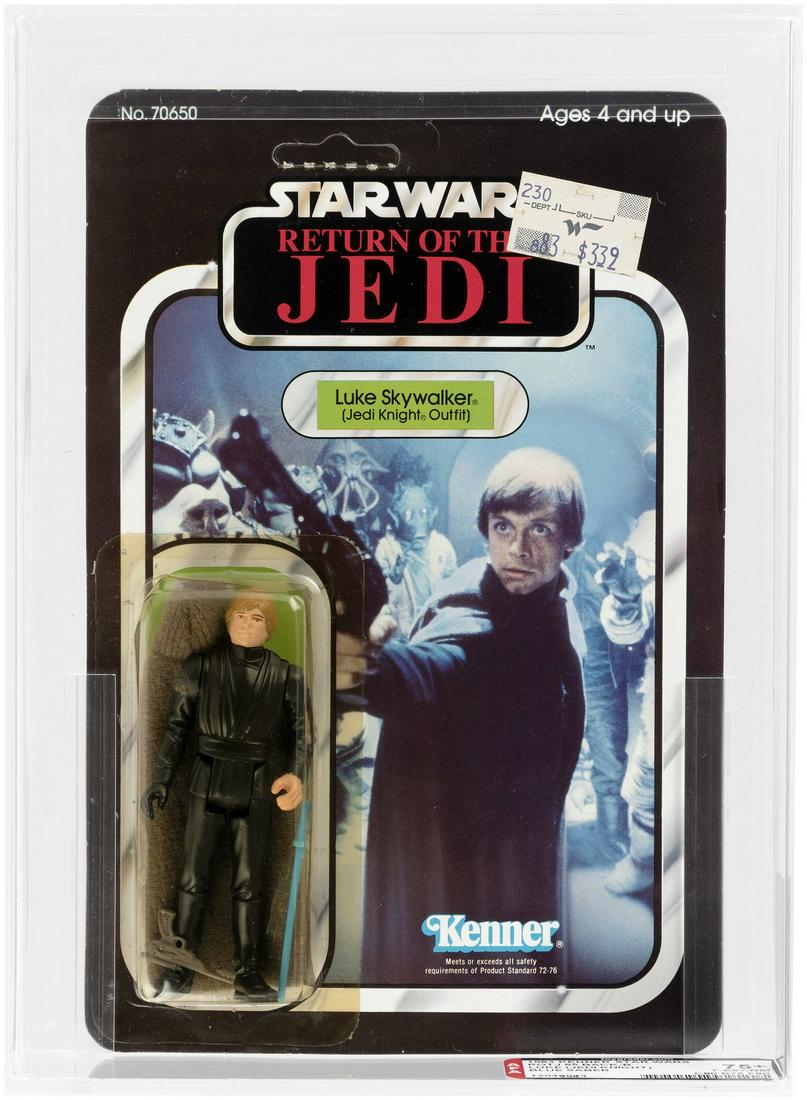 STAR WARS: RETURN OF THE JEDI (1983) - LUKE SKYWALKER (JEDI KNIGHT) 65 BACK-B AFA 75+ Y-EX+/NM (BLUE: Blister card contains 3.75" tall Kenner action figure w/blue saber. Card has been partially punched, but hang tab remains in place. Blister is yellow. AFA subgrades are as follows - C80 B75 F80.