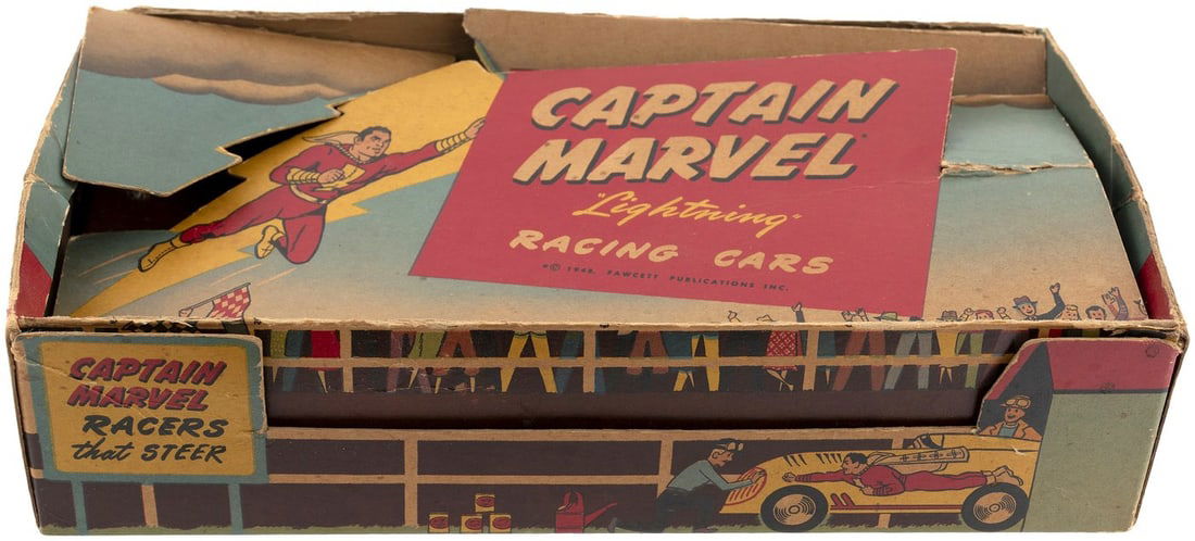 CAPTAIN MARVEL LIGHTNING RACING CARS BOXED SET.: 6.25x11x2.5" deep nicely illustrated cardboard box contains set of four 4" long tin litho cars by Automatic Toy Co. ©1948 Fawcett Publications Inc. Box has die-cut lid and depicts race spectators