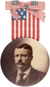 ROOSEVELT 3.5" SEPIA TONED REAL PHOTO BUTTON ON PATRIOTIC RIBBON BADGE.