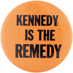 KENNEDY IS THE REMEDY RARE 1960 SLOGAN BUTTON.