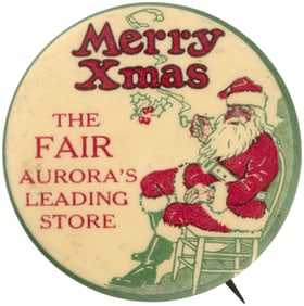 SANTA FIRST SEEN BUTTON WITH HIM IN CHAIR WITH PIPE IN HAND, CURLING SMOKE AND HOLLY ACCENT.