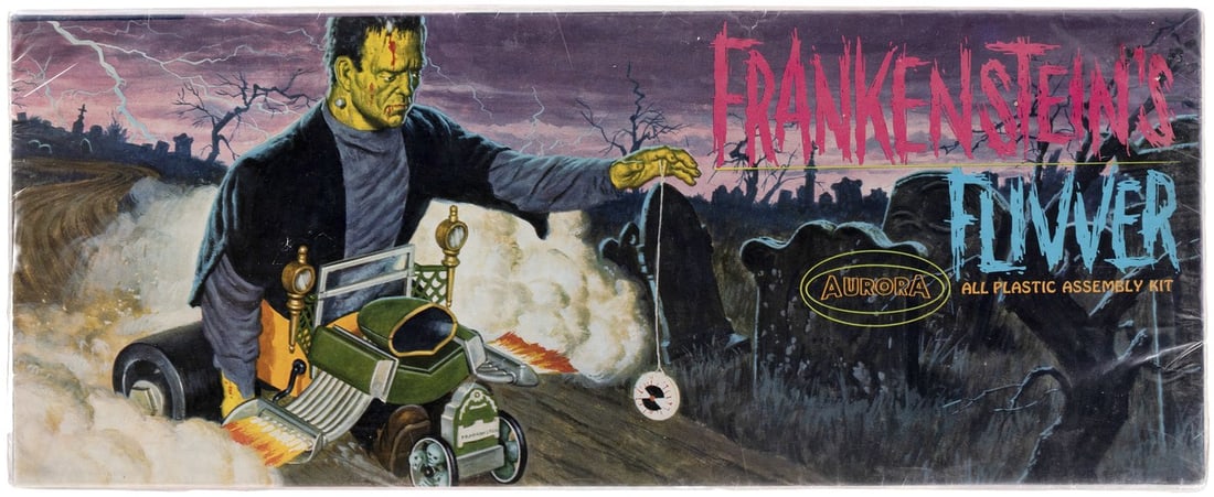 AURORA FRANKENSTEIN'S FLIVVER WAGON FACTORY-SEALED BOXED MODEL KIT.: Kit No. 465-98. ©1964 Universal Pictures Co., Inc. Great design by Aurora maestro James Bama featuring Frankenstein's Monster at the wheel of a tricked-out hot rod w/skull hubcaps and "Frankenste