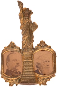 CLEVELAND & THURMAN 1888 STATUE OF LIBERTY JUGATE SHELL BADGE.