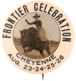 BUCKING BUFFALO WITH COWBOY RIDER BUTTON COPYRIGHTED 1910 FOR CHEYENNE FRONTIER CELEBRATION.