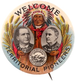 INDIAN CHIEF FLANKED BY WHEAT AND TWO PHOTO PORTRAITS OF SOUTH DAKOTA PIONEERS EARLY 1900s BUTTON.