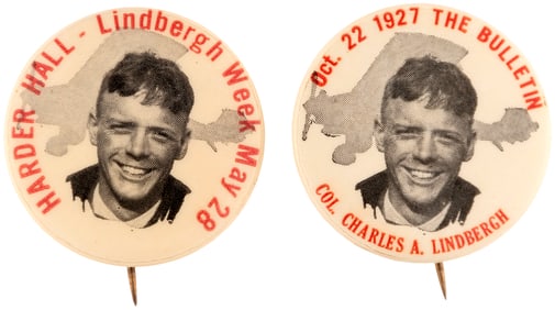 LINDBERGH TWO RARE 1927 BUTTONS SHOWING HIM SUPERIMPOSED OVER THE SPIRIT OF ST. LOUIS.