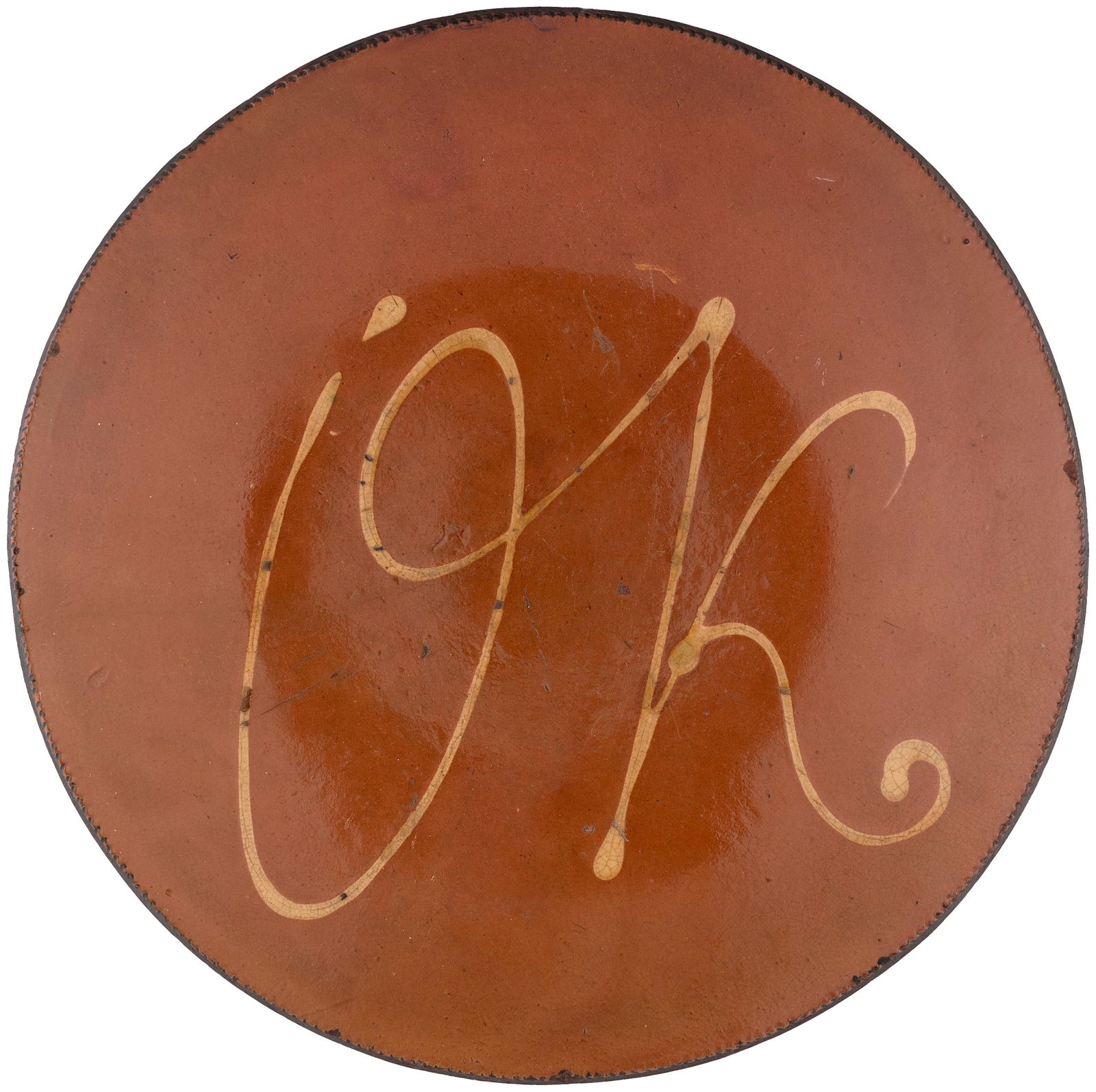 1840 OK MARTIN VAN BUREN CAMPAIGN REDWARE YELLOW SLIP MOTTO CHARGER.: 2" tall, 13" dia. Bold OK likely refers to Old Kinderhook terminology used in Van Buren's 1840 re-election campaign. Redware, coggled edge, w/bold yellow slip script OK. Rich, consistent patina w/no r