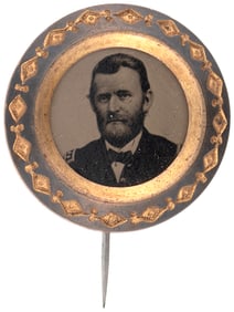 GRANT 1868 FERROTYPE IN BRASS SHELL W/DIAMOND SHAPED ACCENTED BORDER.