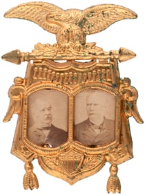 CLEVELAND & STEVENSON PERCHED EAGLE BRASS SHELL 1892 JUGATE BADGE.