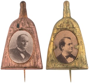 McKINLEY & BRYAN CLEAN SWEEP 1896 FIGURAL BRASS SHELL BROOM BADGE PAIR.