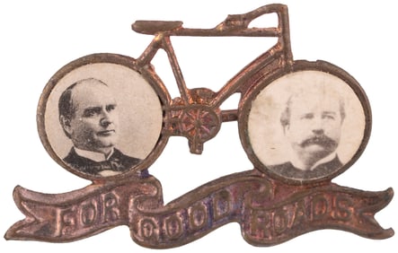 McKINLEY & HOBART "FOR GOOD ROADS" RARE FIGURAL BICYCLE JUGATE BADGE.