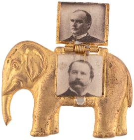MCKINLEY & HOBART 1896 FIGURAL ELEPHANT MECHANICAL JUGATE BADGE.