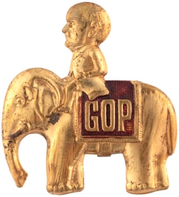 MCKINLEY 1896 "GOP" ELEPHANT BRASS SHELL PINBACK BADGE.