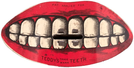 TEDDY'S TRADEMARK TEETH LITHOGRAPHED TIN NOVELTY.