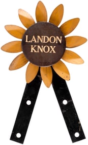 LANDON KNOX RARE SPINNING SUNFLOWER 1936 LICENSE PLATE ATTACHMENT.