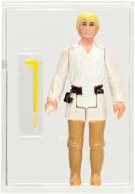 STAR WARS (1977) - LOOSE ACTION FIGURE/HK LUKE SKYWALKER AFA 75+ EX+/NM (ENGINEERING PILOT).