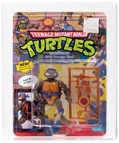 TEENAGE MUTANT NINJA TURTLES (1991) - DONATELLO WITH STORAGE SHELL SERIES 4/44 BACK CAS 85.