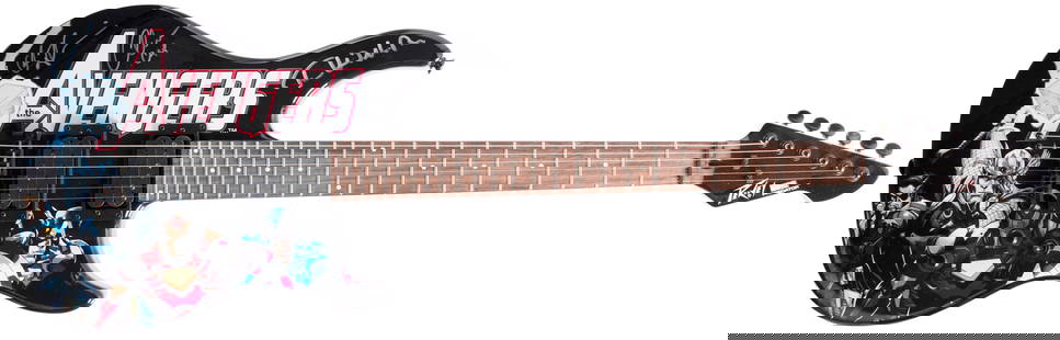 MARVEL - THE AVENGERS - PEAVEY PREDATOR GUITAR SIGNED BY ACTORS EVANS, HEMSWORTH AND HIDDLESTON.: 39" long Peavey Predator electric right hand 6 string guitar. Serial #BXBCE050233. The Avengers themed guitar features graphics of Captain America, Iron Man, Thor and classic Nick Fury. Black lacquere