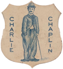 CHARLIE CHAPLIN LITHO TIN SHIELD BADGE C. 1916.