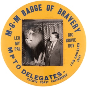 LARGE M-G-M BADGE OF BRAVERY” BUTTON GIVEN 1941 THEATRE OWNERS POSING WITH LEO THE LION.