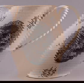 "BUONAPARTE, JEFFERSON, JOHN BULL" RARE C.1807 LIVERPOOL CREAMWARE JUG.: 12" tall. Cartoon illustration of Buonaparte pulling at the cow's tale, John Bull at the horns & Thomas Jefferson reaping the rewards of the standstill by milking the cow. Each figure is named & appea