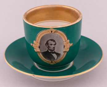 LINCOLN PORCELAIN CUP & SAUCER WITH PHOTOGRAPHIC TRANSFER PORTRAIT.