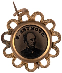 "H. SEYMOUR" FERROTYPE IN ORNATE BRASS SHELL PIN-BACK BADGE HAKE #3021.