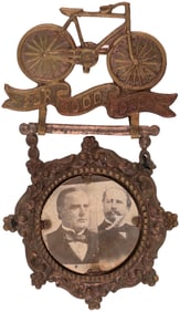 McKINLEY & HOBART "FOR GOOD ROADS" BRASS SHELL JUGATE BADGE HAKE #3105.