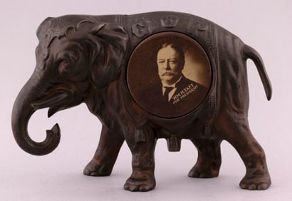TAFT FIGURAL CAST IRON "GOP" ELEPHANT FEATURING 2.25" PORTRAIT CELLO BUTTON.
