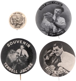 EARLY BARNUM & BAILEY BUTTON PLUS TRIO OF ANIMAL TRAINER BUTTONS.