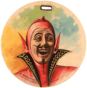 1902 MAN IN DEVIL'S COSTUME DOUBLE-SIDED CELLULOID FOB.