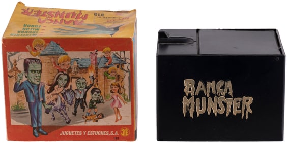 THE MUNSTERS 1960s BOXED SPANISH BATTERY-OPERATED BANK.