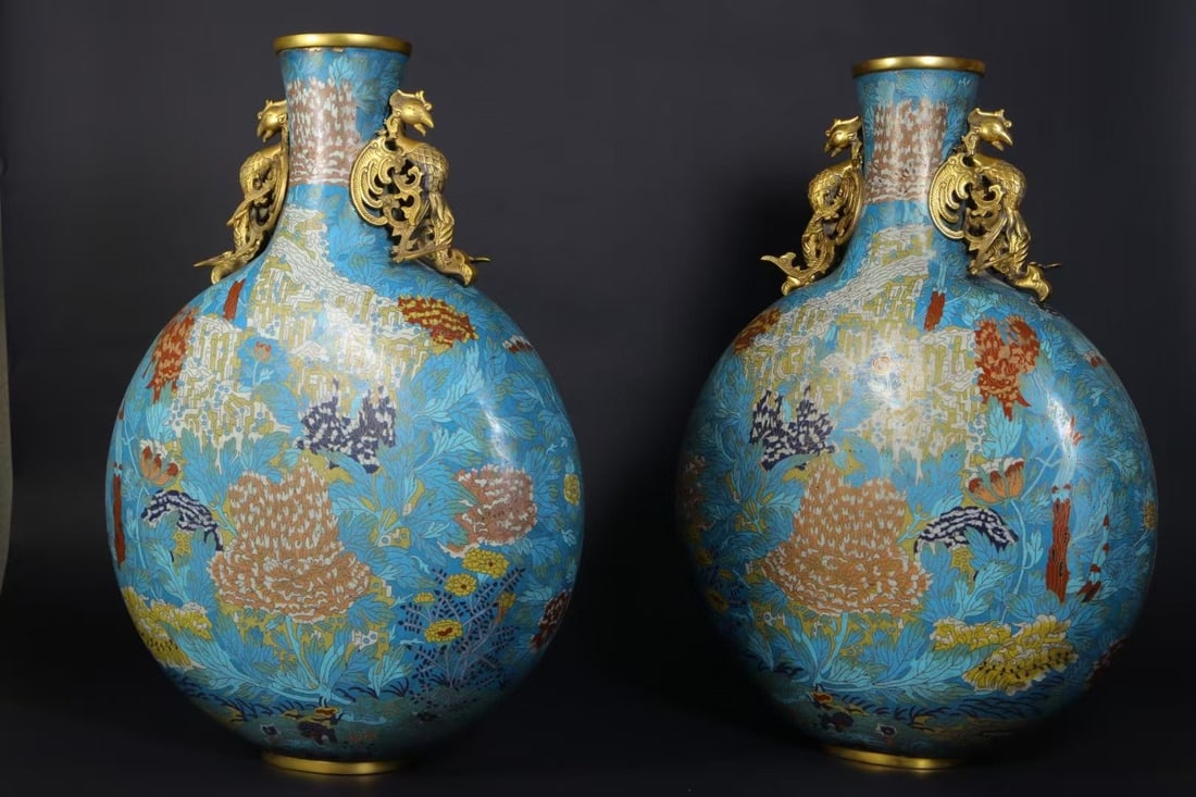 A pair of Qing Dynasty gilt bronze cloisonné floral moon flasks: A pair of Qing Dynasty gilt bronze cloisonné floral moon flasks H56.8cm W38cm