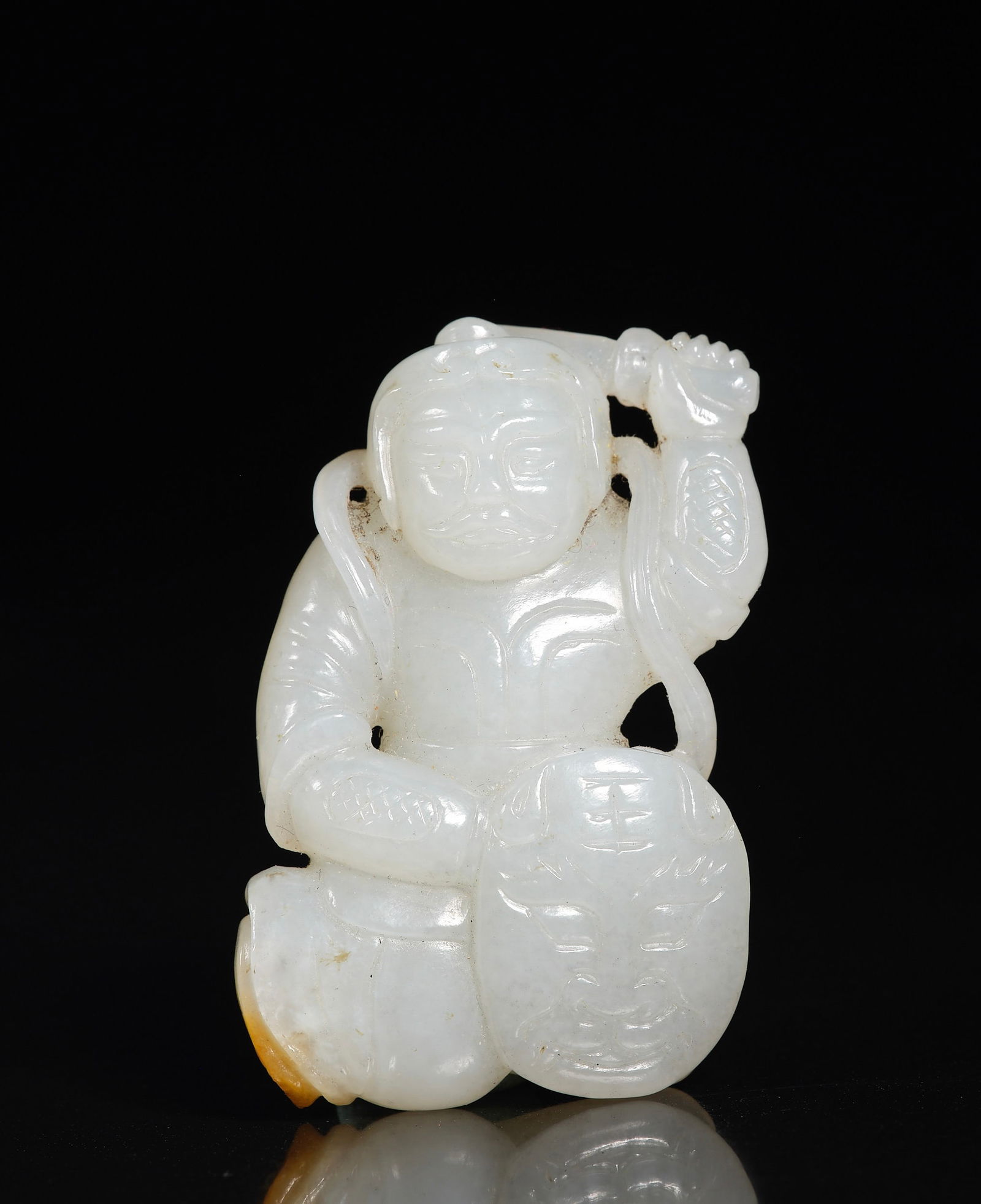 Hetian jade figure holding a sword from the Qing Dynasty (1 of 6)