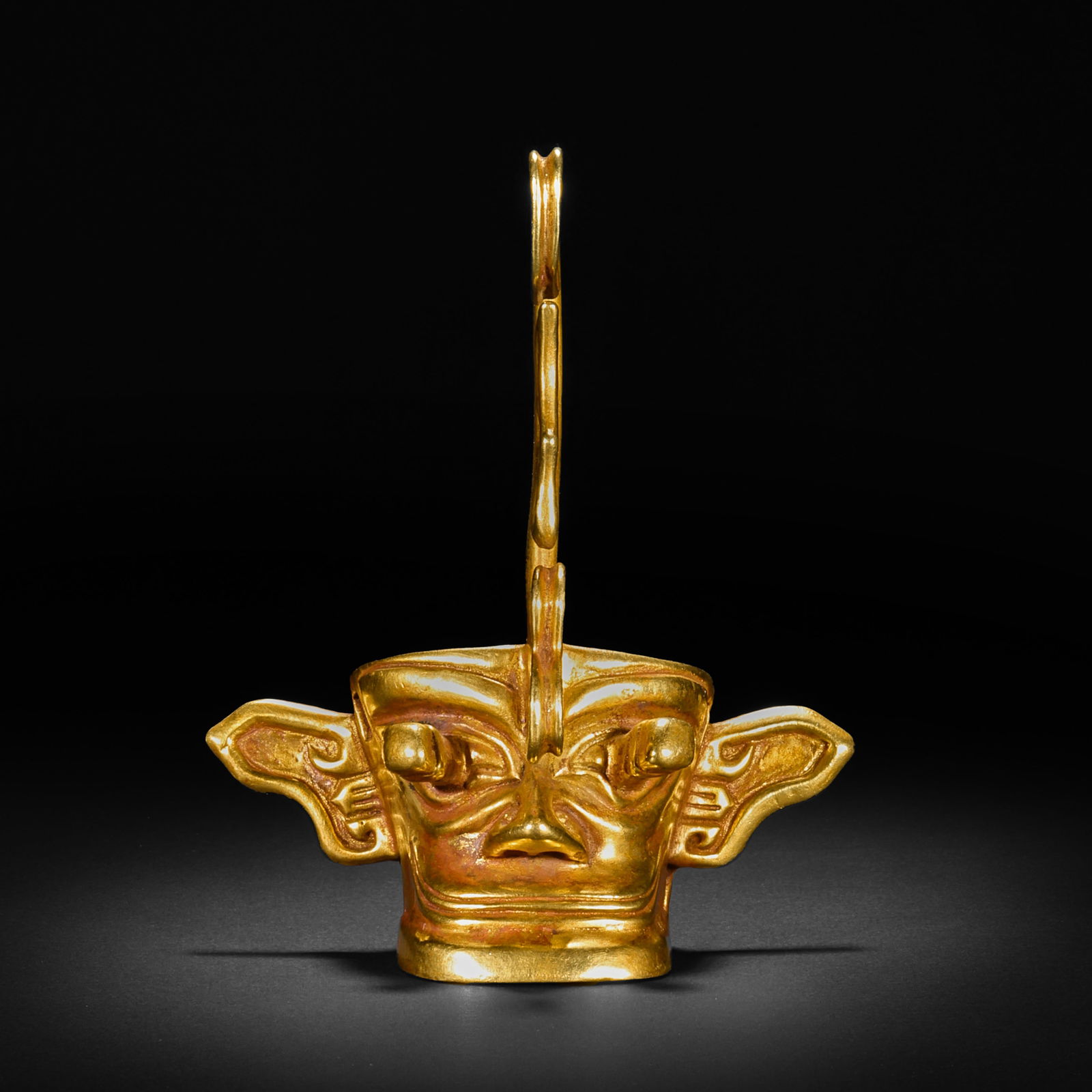 Pre-Ming Dynasty gold-plated Sanxingdui faces (1 of 11)