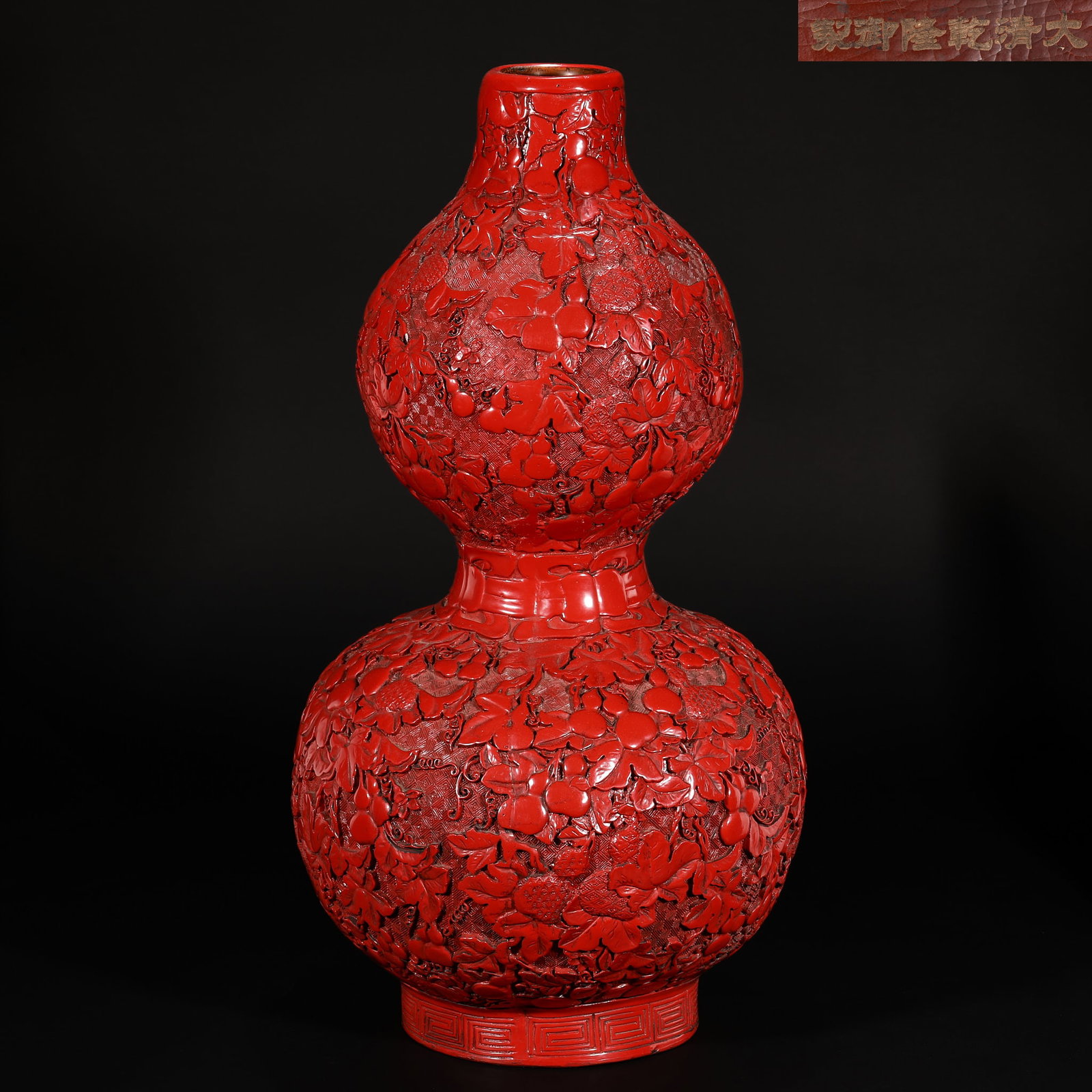 Qing Dynasty carved red lacquer gourd-shaped bottle (1 of 14)