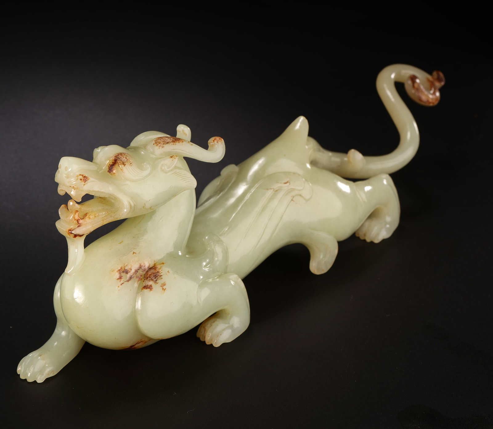 A dragon-shaped world ornament from Hotan before the Ming Dynasty (1 of 11)