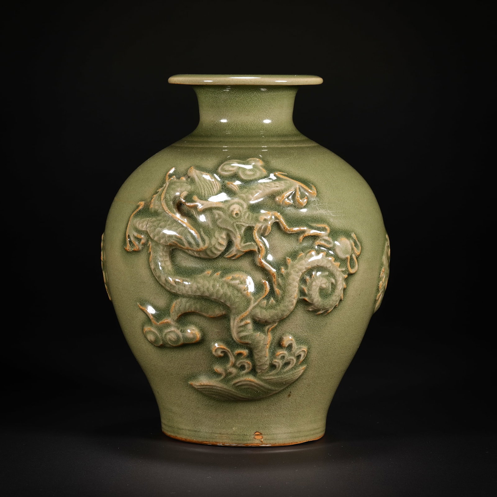 Before the Ming Dynasty celadon pile carved dragon and phoenix pattern bottle: H17cm W13cm