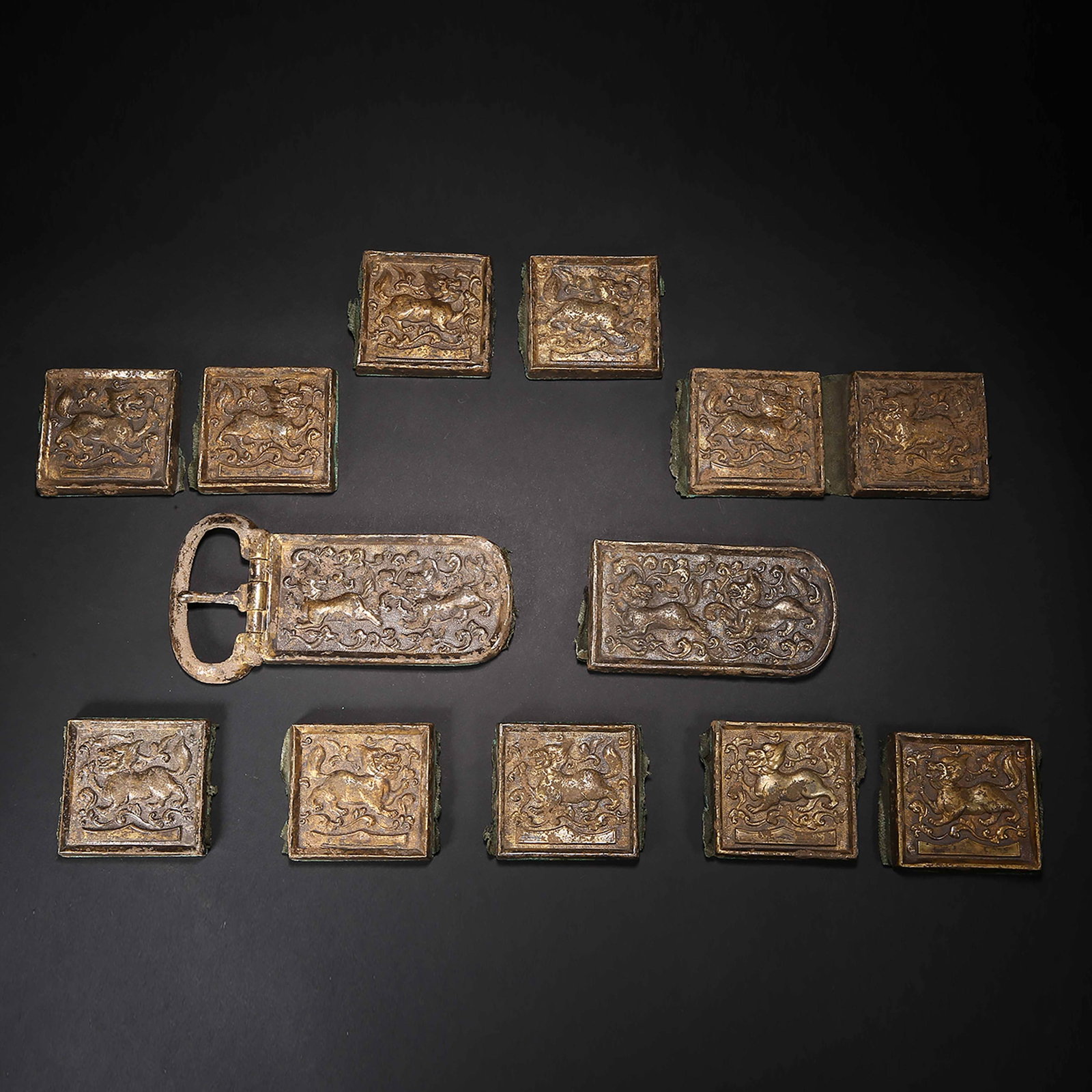Before the Ming Dynasty, silver gilt god beast belt plate: H9.5cm W19cm Weight2008g