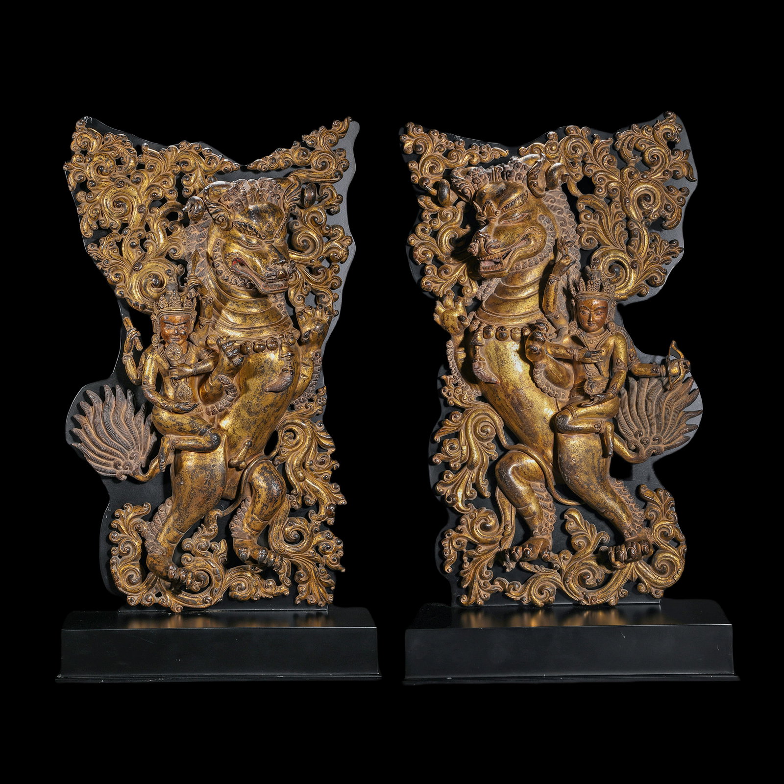 A pair of bronze and gold-plated protectors in the Ming Dynasty: H51 cm W 33cm