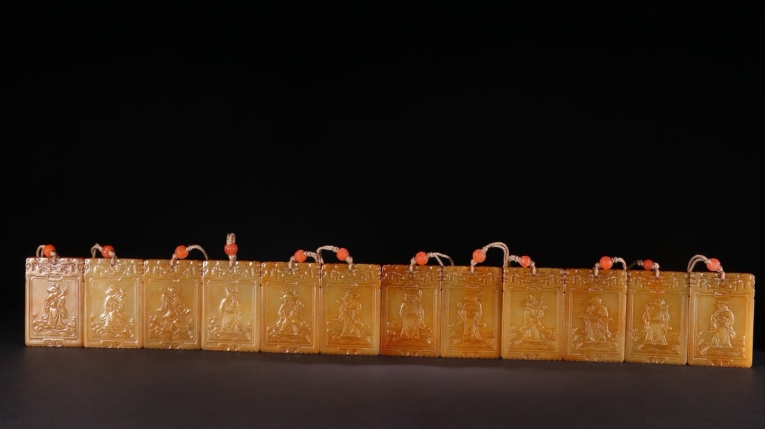 A set of twelve zodiac cards of Hetian Topaz in Qing Dynasty: H6.6 cm W4.3 cm Wight60g