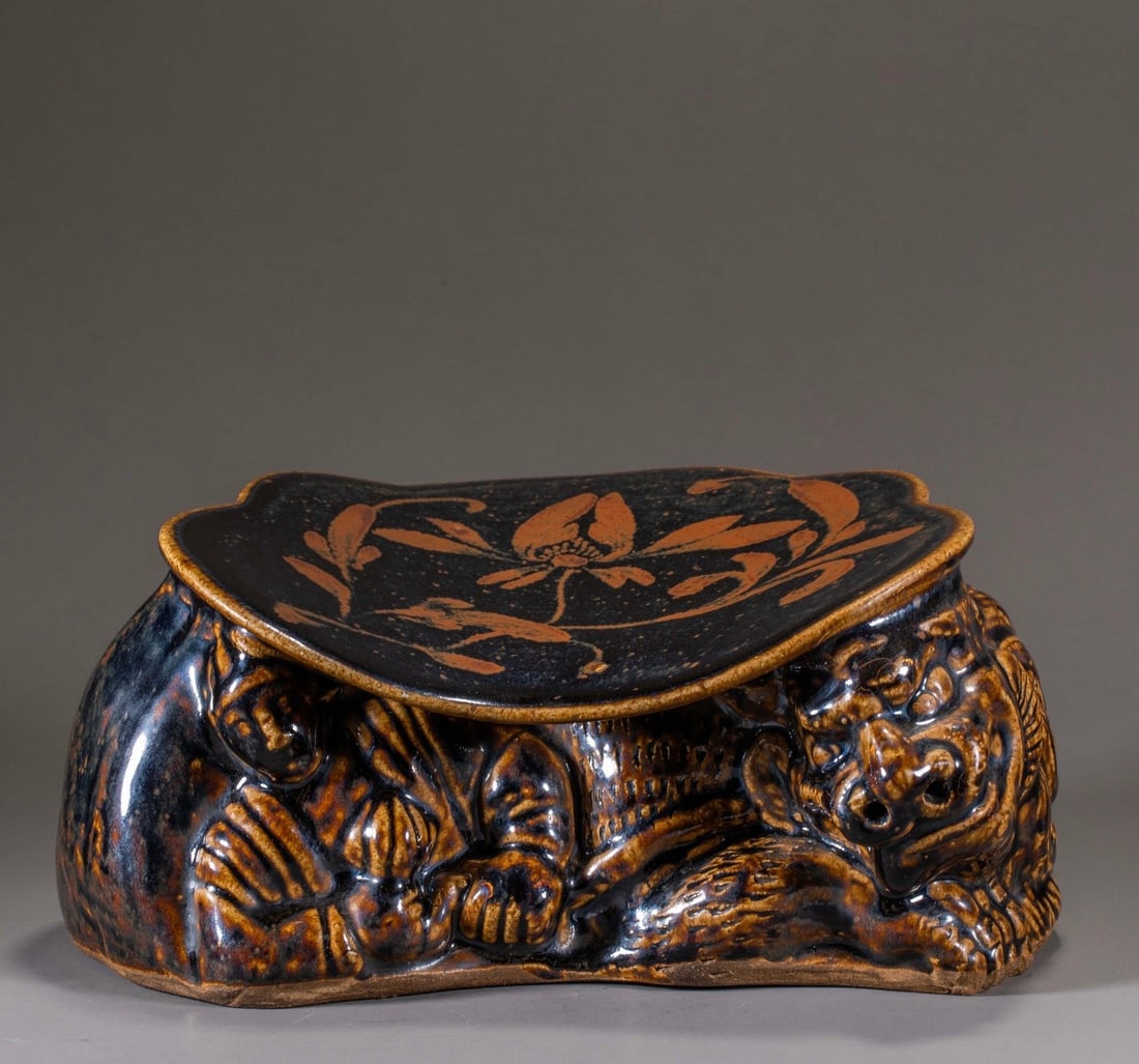 Before the Ming Dynasty, the sauce glaze flower pillow: H13cm W27cm
