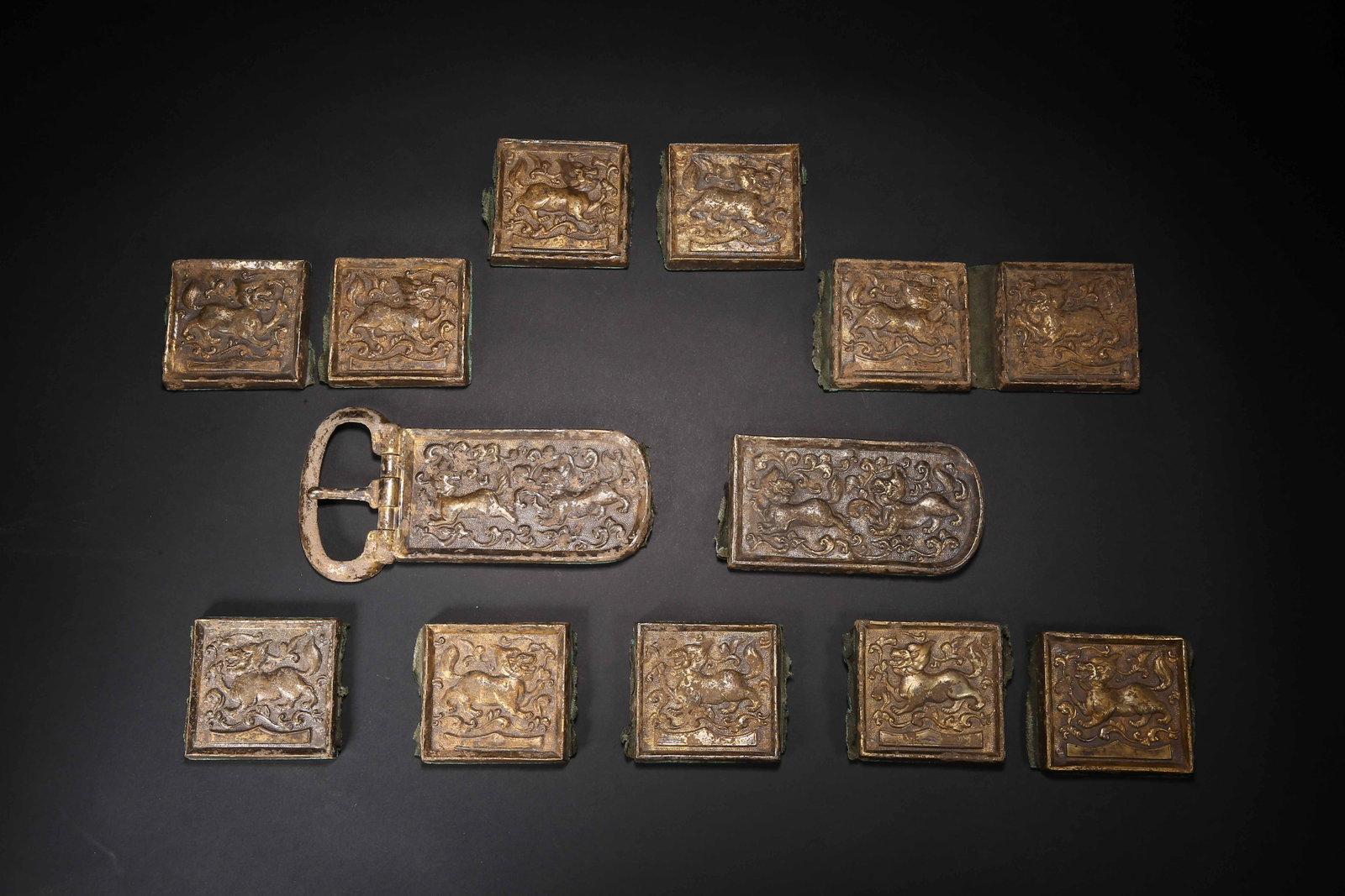 Before the Ming Dynasty, silver gilt god beast belt plate: H9.5cm W19cm Weight2008g