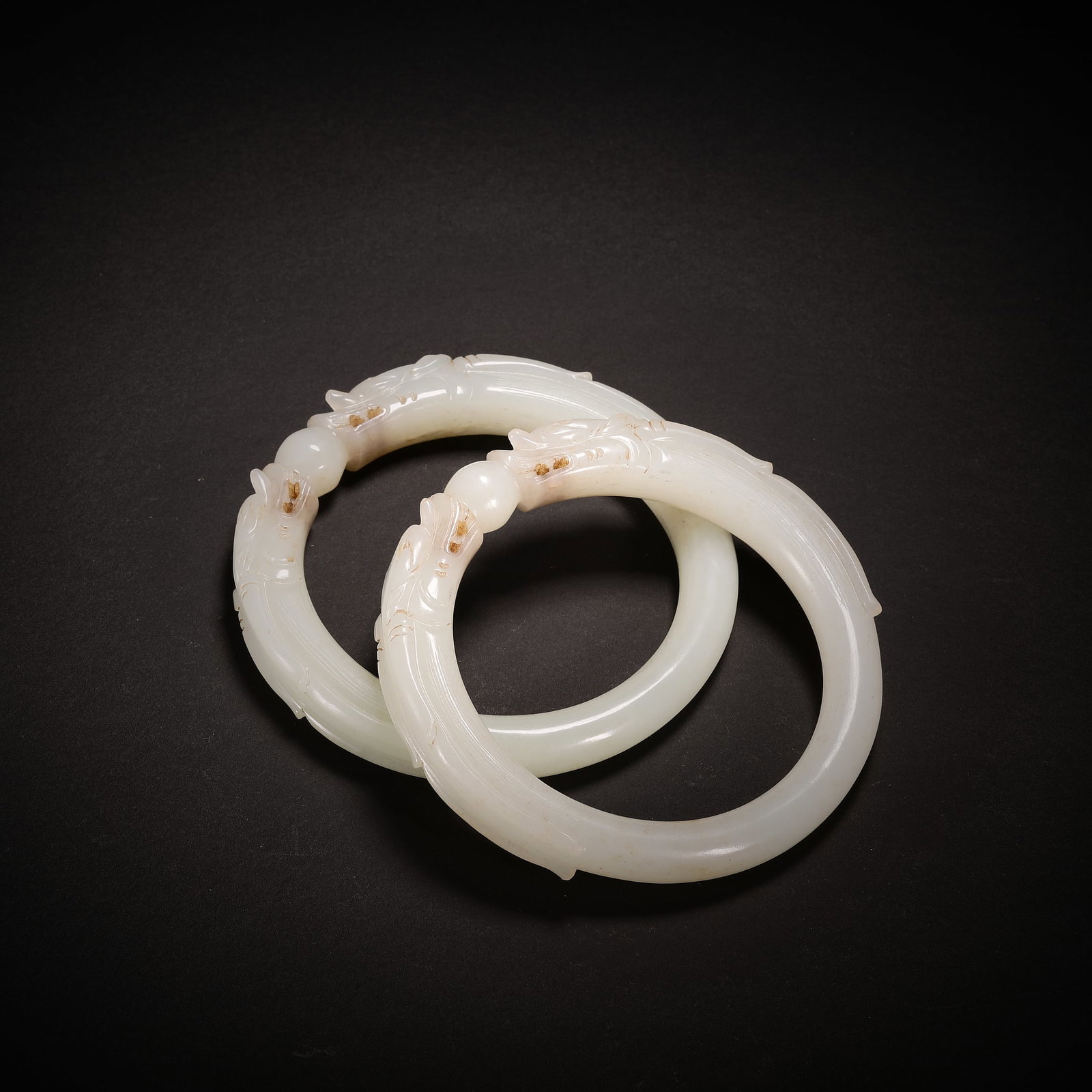 A Pair of Qing Dynasty Hetian Jade Double Dragon Bead Bracelets (1 of 9)