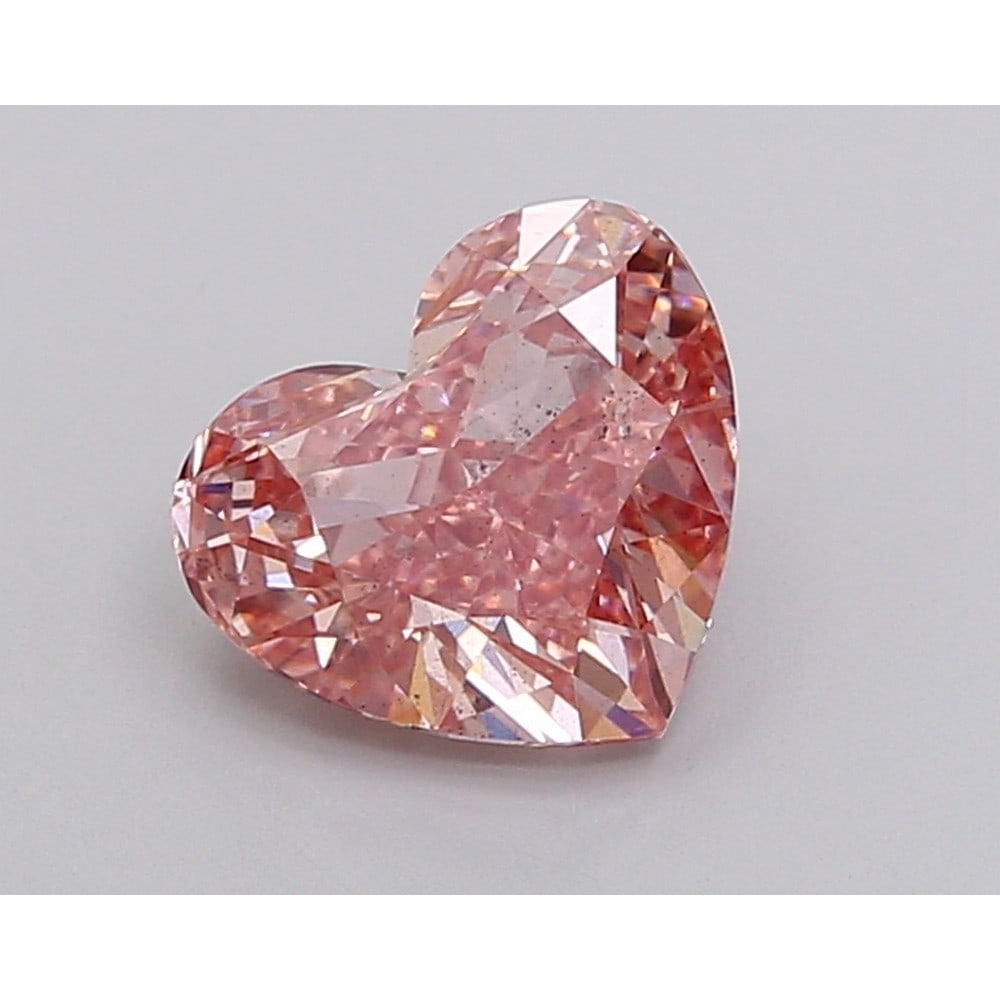 1.73 ct, Fancy Vivid Pink/SI1, Heart cut IGI Graded Diamond: Click here to view HD 360 Spinning Image Click here to view Certificate Report