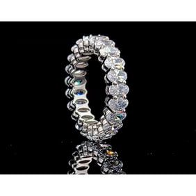 14kt White Gold 5.63 ct Oval Cut Diamond Eternity Band