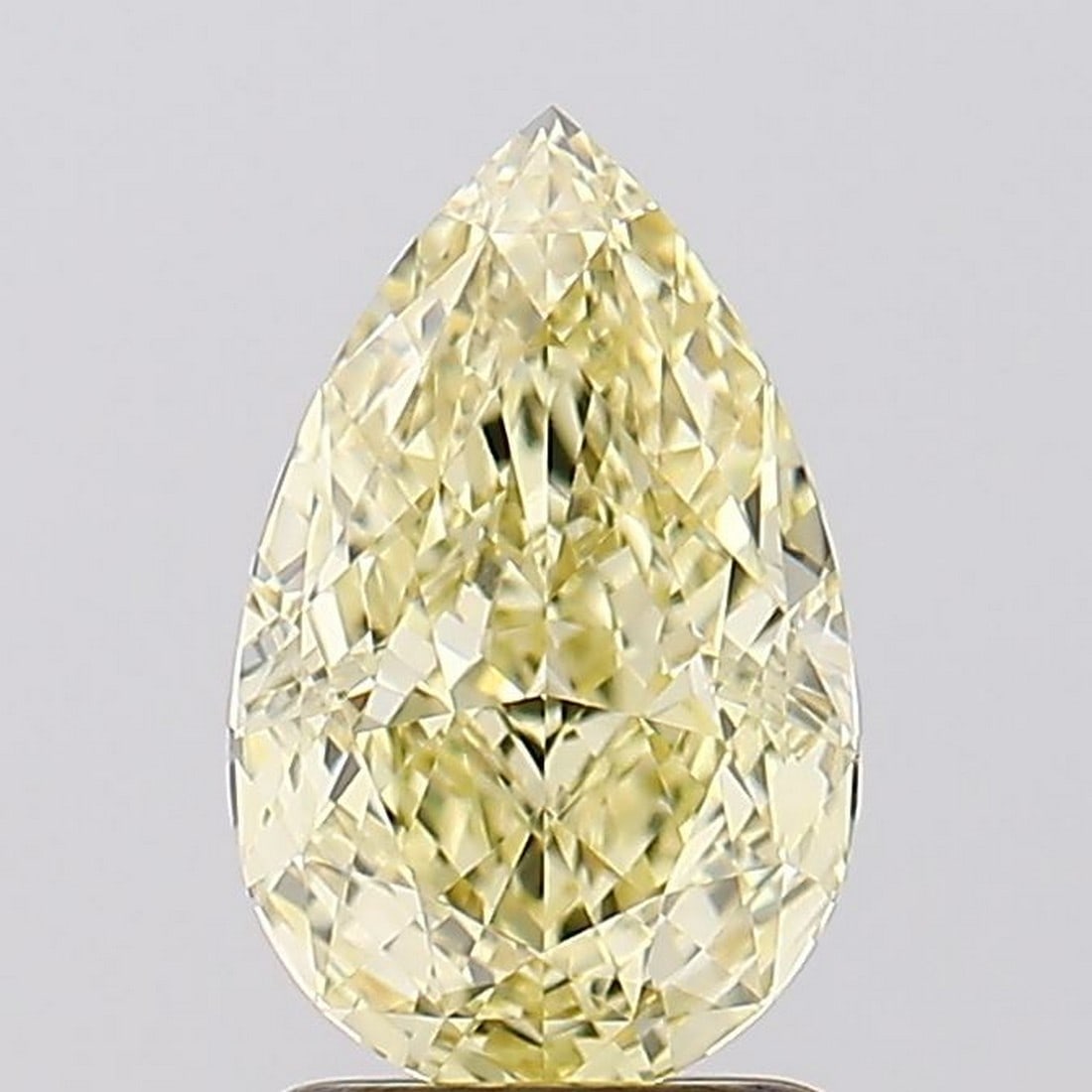 2.08 ct, Fancy Yellow/VVS2, Pear cut IGI Graded Diamond: Click here to view HD 360 Spinning Image Click here to view Certificate Report IGI Graded
